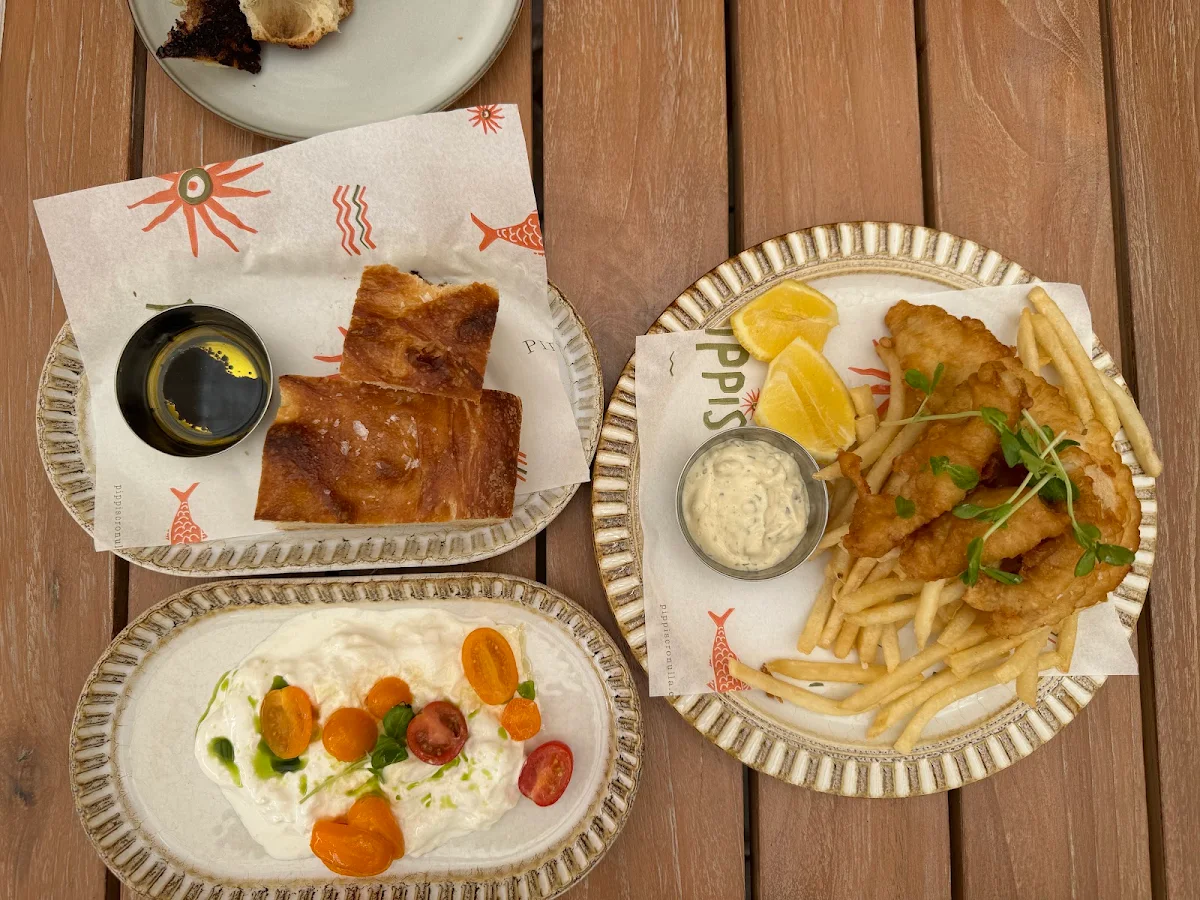 Sourdough Stracciatella Marinated Tomato Basil Oil and Fish and Chips