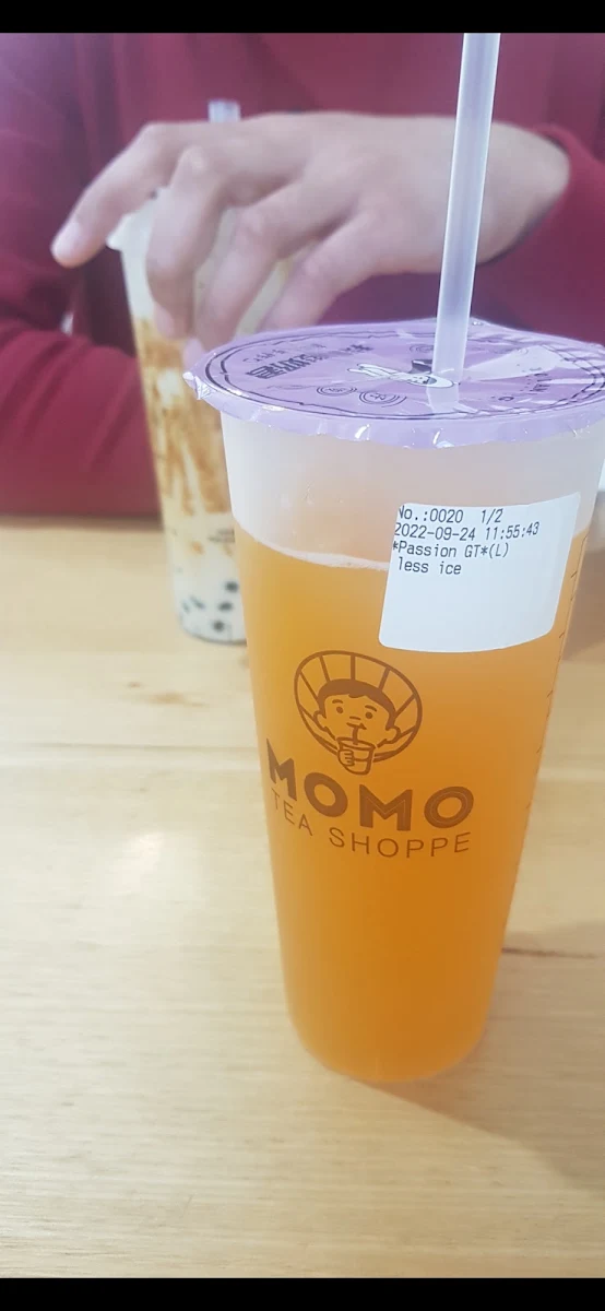 qq Passionfruit Tea with Black Pearls Coconut Jelly and Passionfruit Seed