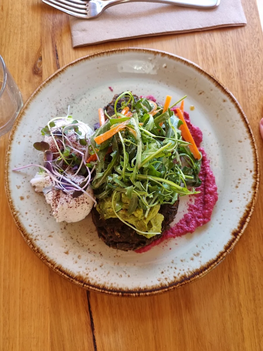 Buckwheat and Green Veg Fritters with Avo Beetroot Hummus Tomato Relish and Poached Eggs