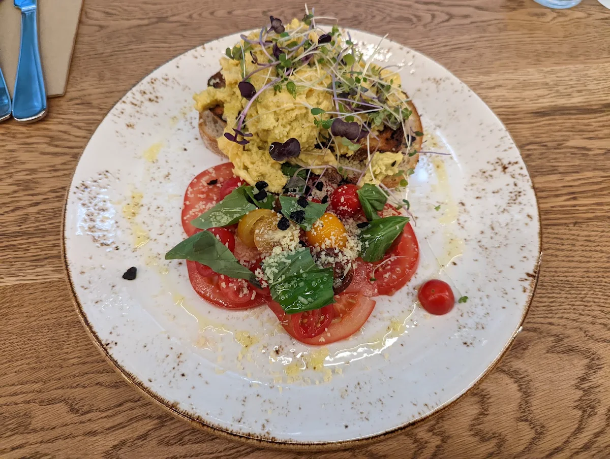 Verde Scrambled Eggs on Garlic Toast with Heirloom Tomatoes