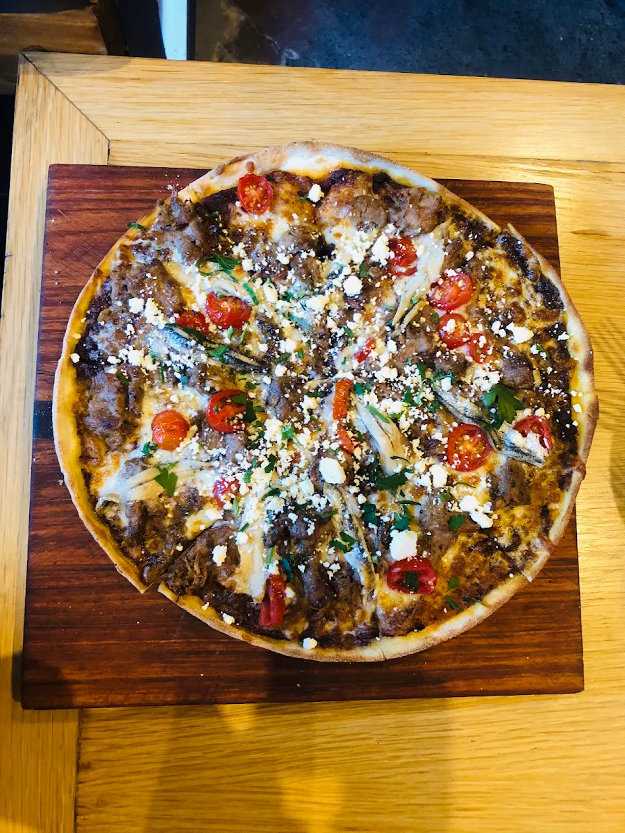 Pulled 12-Hour Lamb Shoulder Olive Tapenade Feta Oregano & Cherry Tomatoes
