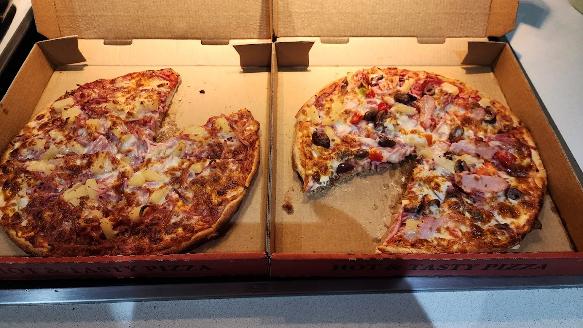 Hawaiian Pizza and Super Supreme Pizza