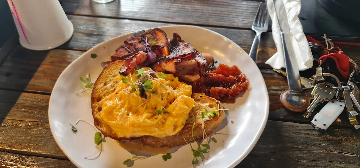 Scrambled Eggs on Toast with Crispy Bacon on the Side
