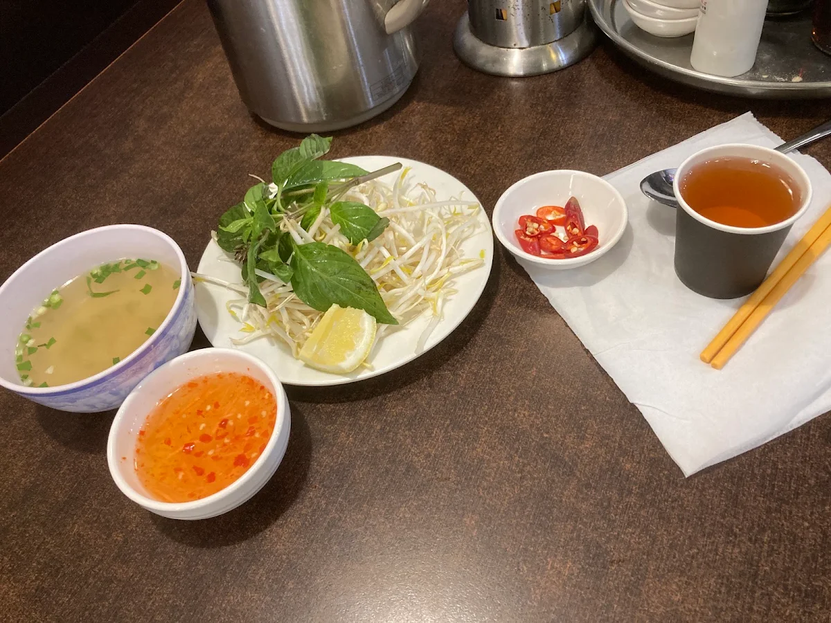 Side Basil Bean Sprouts Lemon Wedge Chilli Chicken Soup Pickled Carrot Fish Sauce