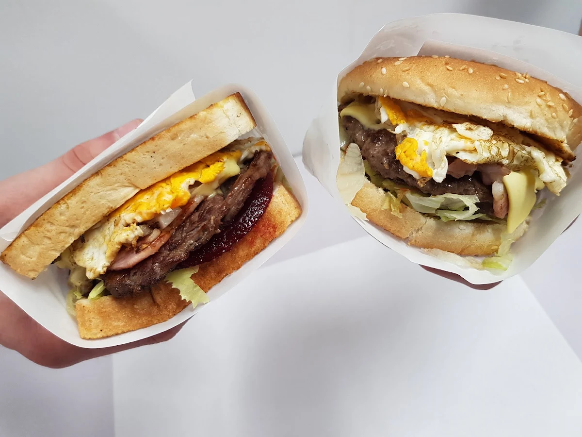 Steak Sandwich with the Lot Left & Hamburger Lot Right