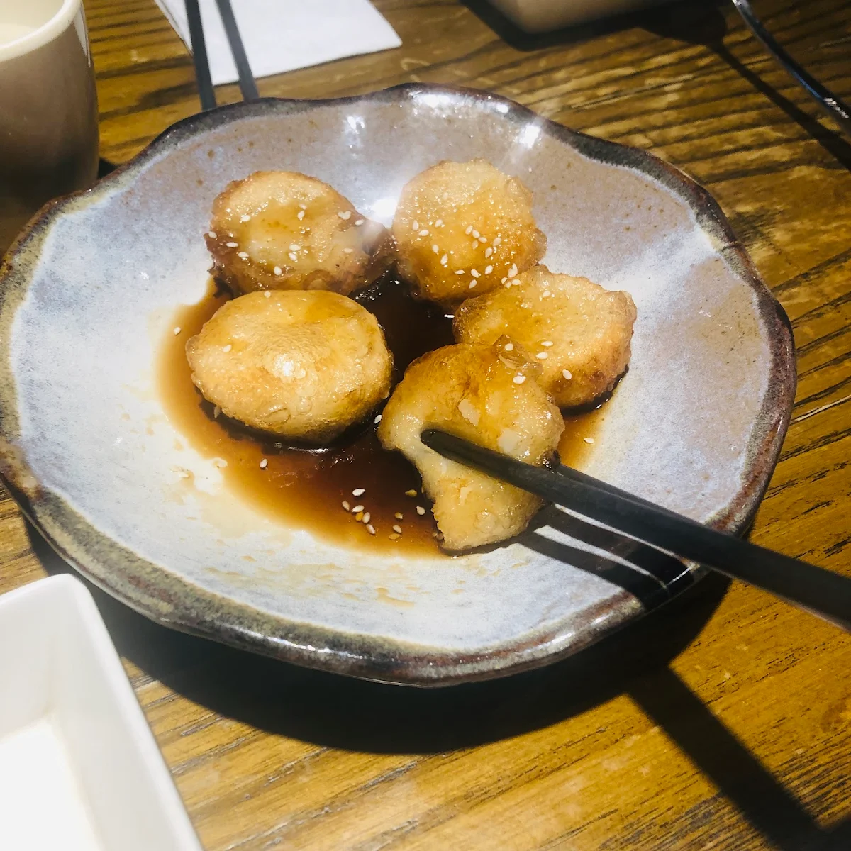 Deep Fried Sticky Rice Dipped in a Brown Sugar Syrup Sprinkled with Toasted Sesame Seeds 5pcs