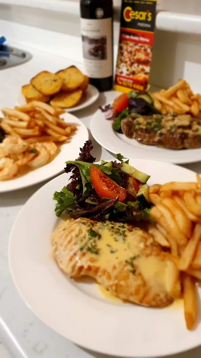 Porterhouse Steak Garlic Prawns Tropical Pizza House Garlic Bread