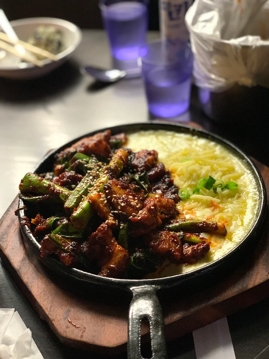 Fire Grilled Pork in Spicy Sauce Served with Mozzarella Cheese