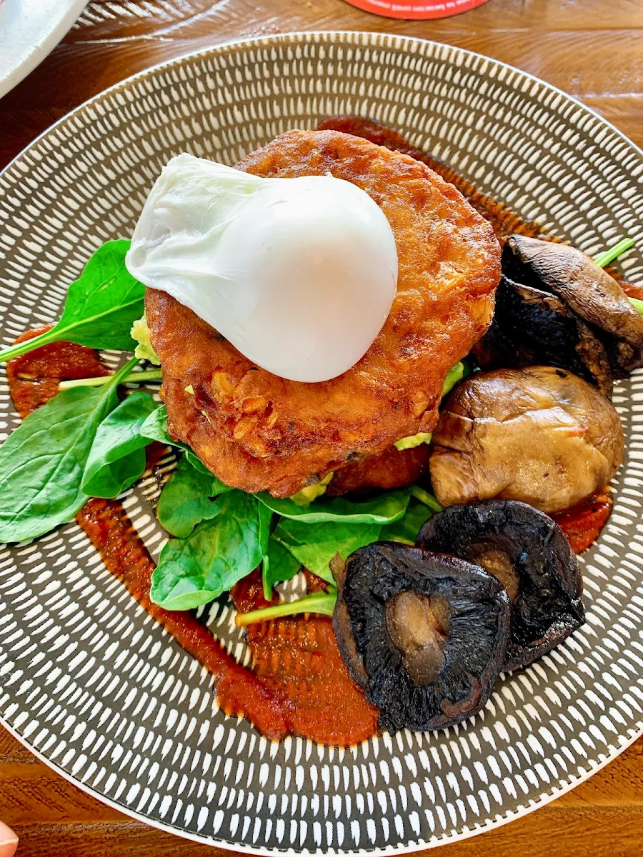 Corn Fritters with Poached Egg Mushroom Spinach and Tomato Relish