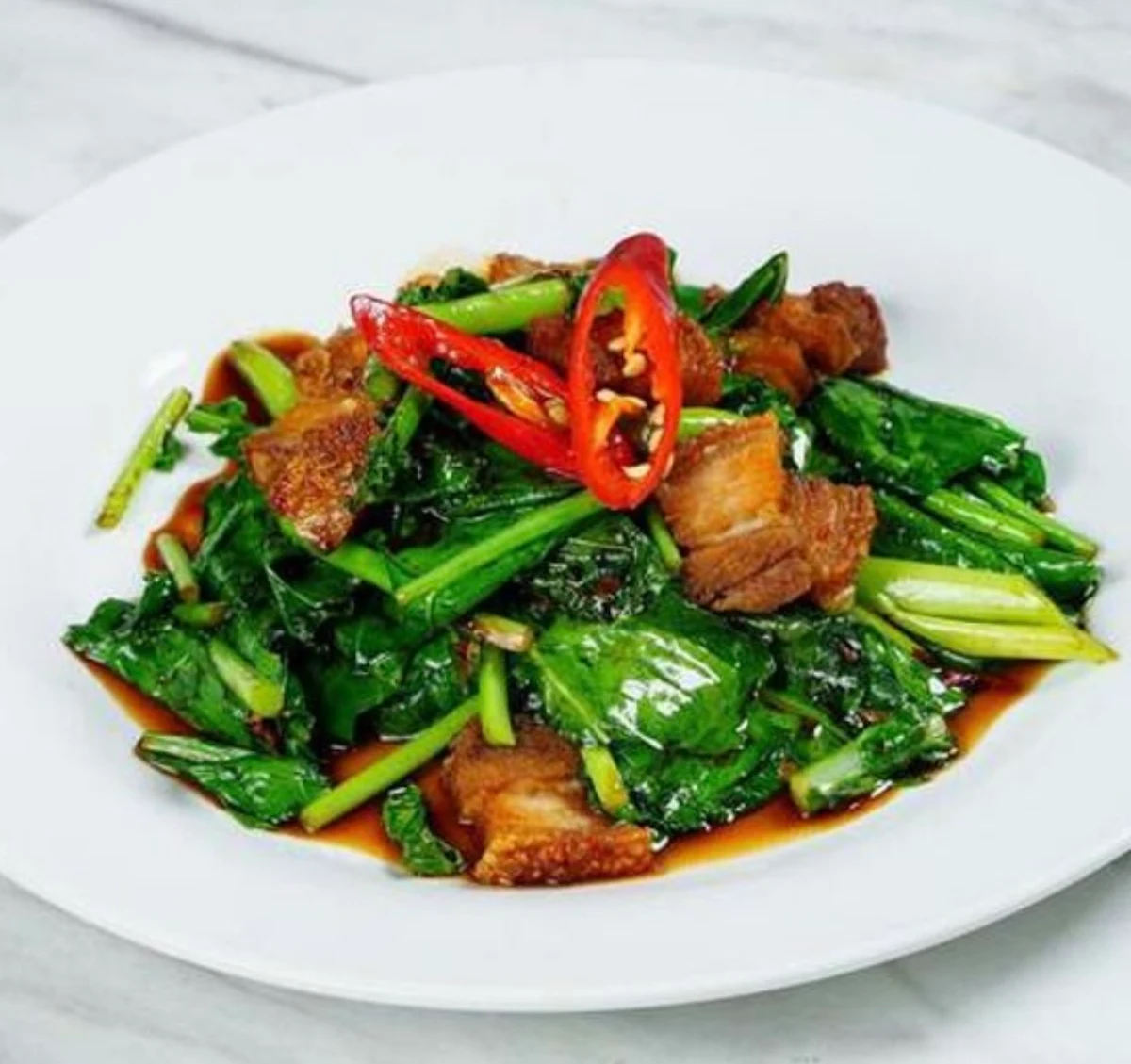 Stir Fry Green Veggies with Crispy Pork Belly Kha Na Moo Krob