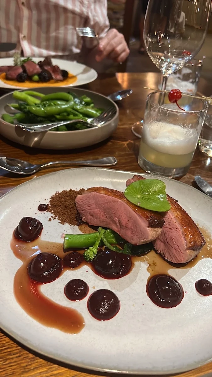 Roasted Duck Breast with Confit Duck Leg Rhubarb and Boudin Noir
