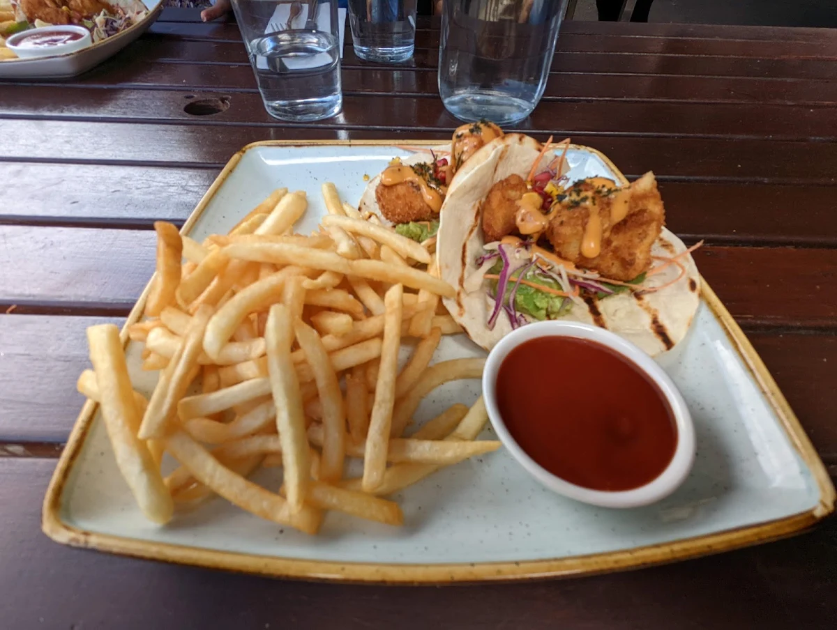 Vegan Buffalo Cauliflower Tacos with Shoestring Fries