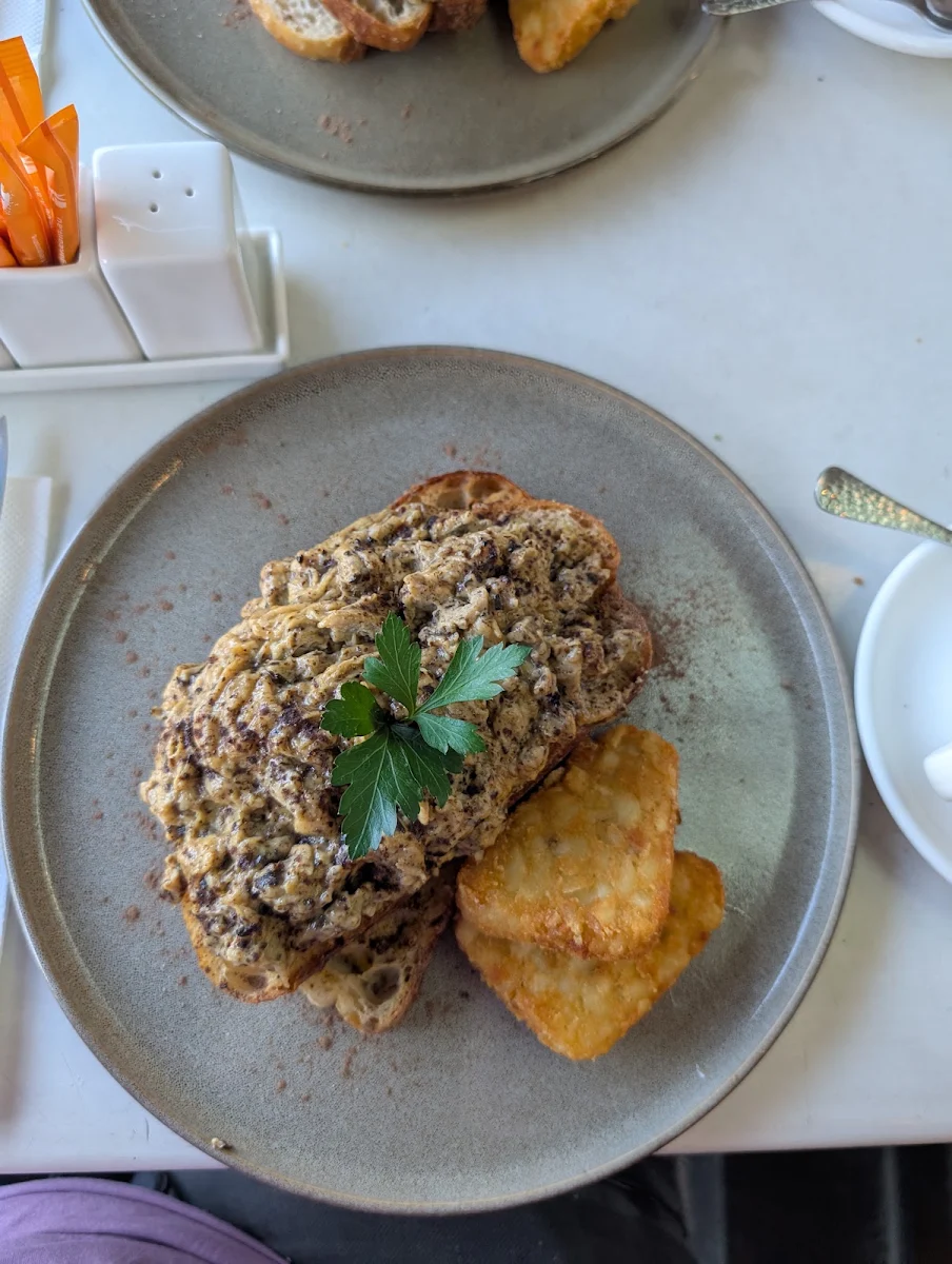 Truffle Scrambled Eggs with Hash Brown on Sourdough with Truffle Dust