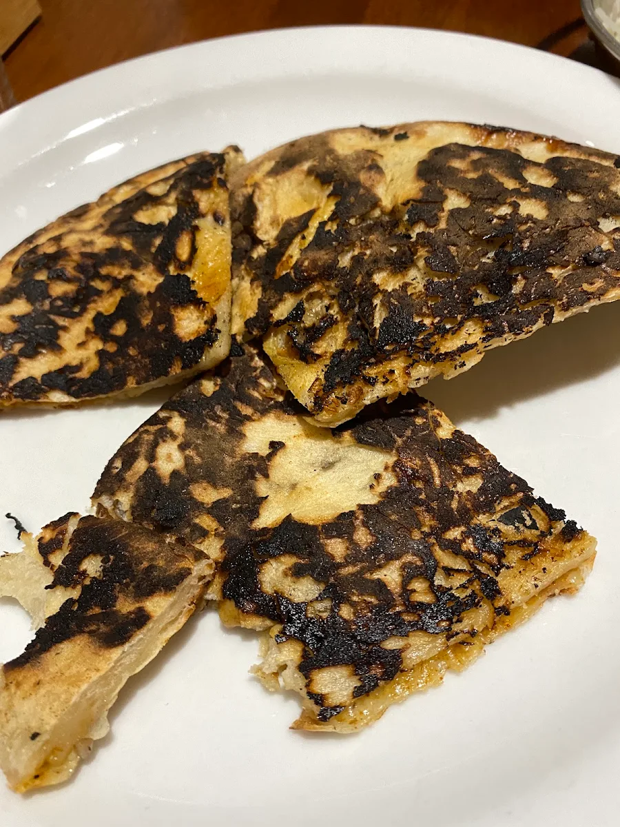 Burnt Naan Bread, Tikkka N Talkk Indian Restaurant
