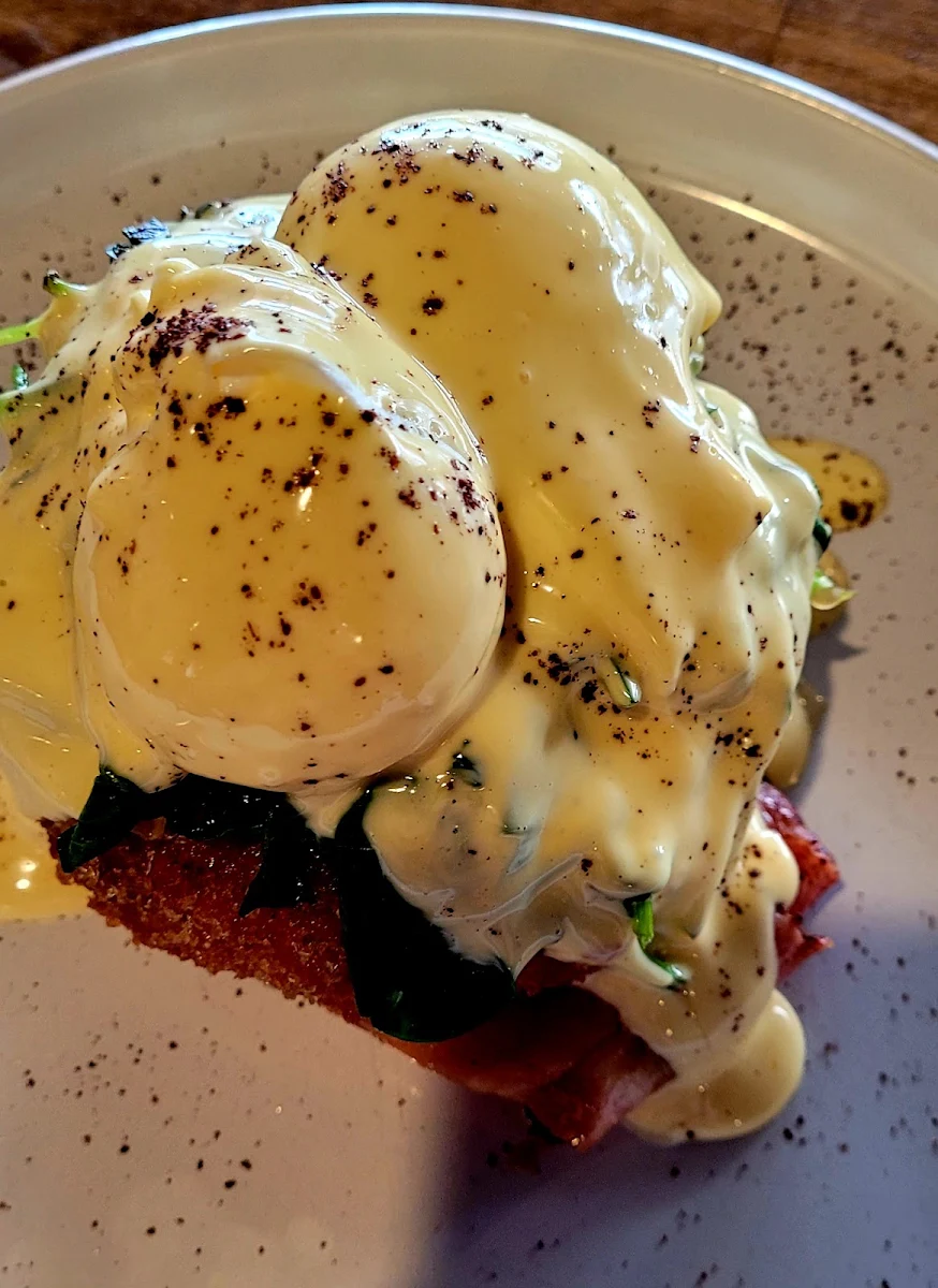 Potato Cake Bacon Poached Eggs Benedict