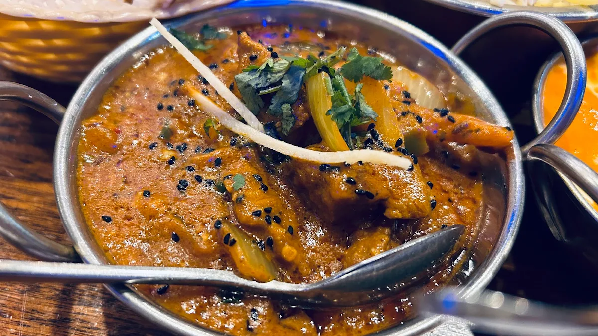 Garlic Naan Saffron Rice Butter Chicken Lamb Bhuna