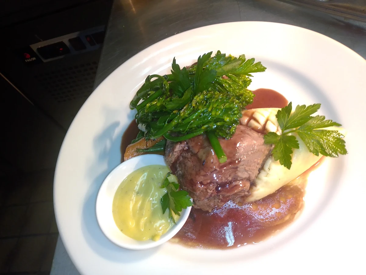 Pan Fried Eye Fillet Truffle Mashed Potatoes Seasonal Vegetables Bearnaise and a Red Wine Demi Glaze