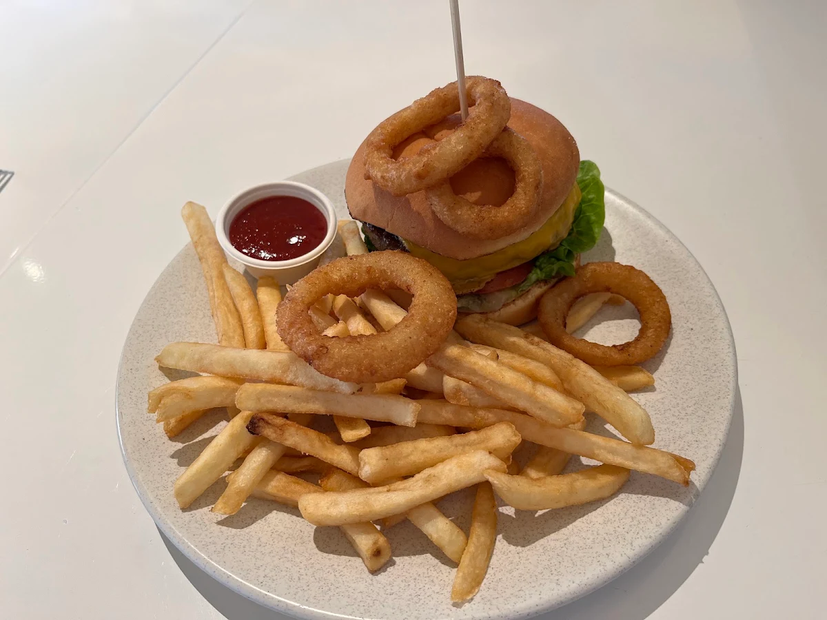 Beef Burger and Fries and Onion Rings