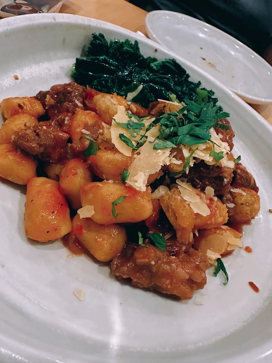 Slow Cooked Wagyu Beef Ragu with Potato Gnocchi Seasonal Greens & Parmesan