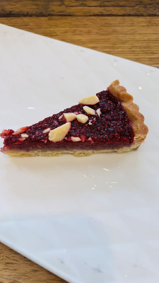 Raspberry white chocolate almond tart