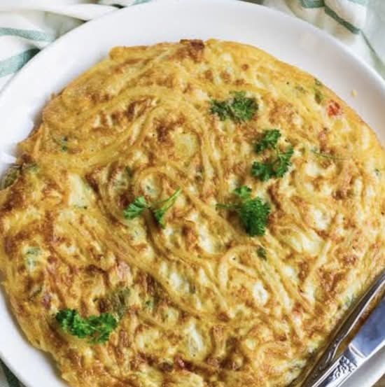 Spaghetti omelette (African) you can add our special chilli sauce in the omelette on demand