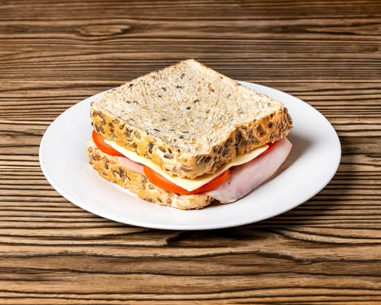 Ham, Cheese, Tomato and Mayonnaise Toasty on Multigrain Bread