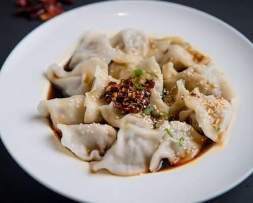 Steamed Dumplings with Spicy & Sour Soup(Non Vegetarian)
