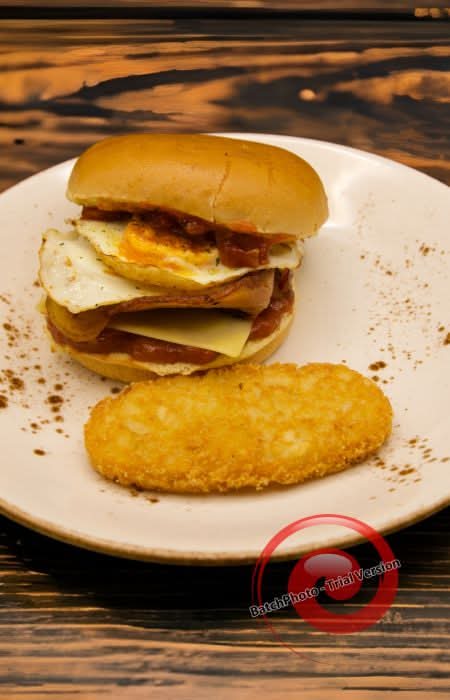 Bacon & Egg Roll With A Hash Brown