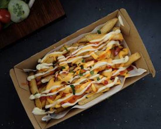Loaded Chips with cheese sauce