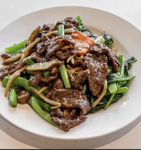 Stir Fried Beef Fillets on Chinese Broccoli with Garlic and Ginger