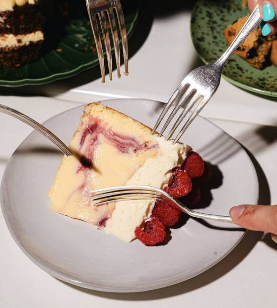 Slice of White Chocolate & Raspberry Cheesecake
