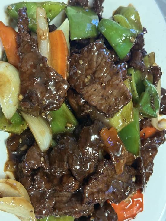 Steak with Vegetables and Black Pepper Sauce