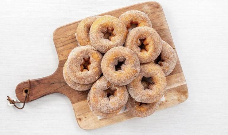One dozen cinnamon donuts