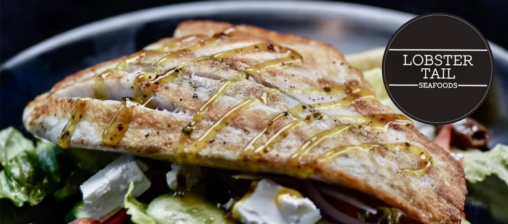 Grilled Barramundi Garden salad & chips