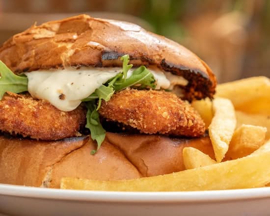 Chicken Schnitzel Burger and Chips + Free Can of Soft Drink or Chocolate Brownie